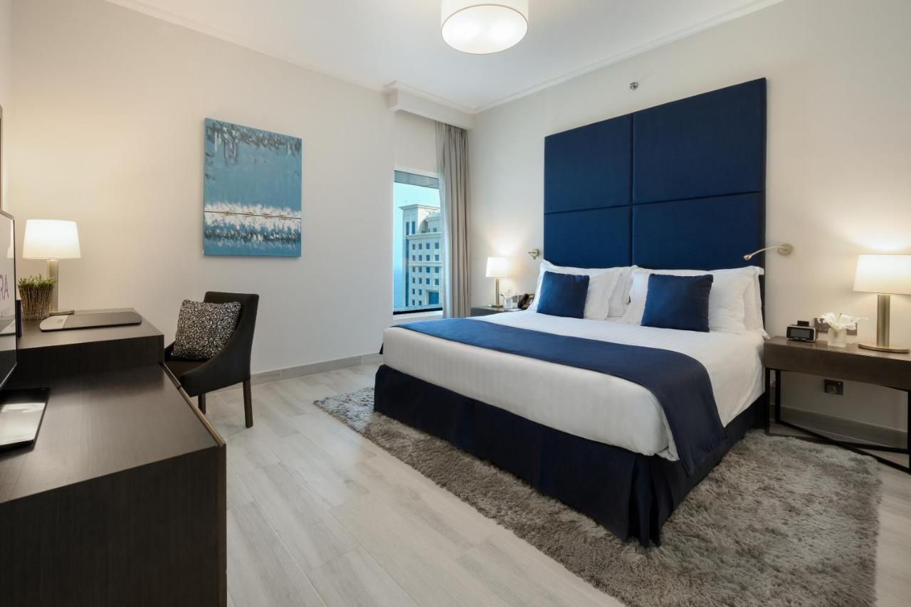 Centara West Bay Hotel & Residences Ad-Dauha Zewnętrze zdjęcie A bedroom at the hotel