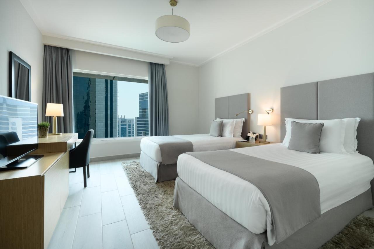 Centara West Bay Hotel & Residences Ad-Dauha Zewnętrze zdjęcie A guest room at the hotel