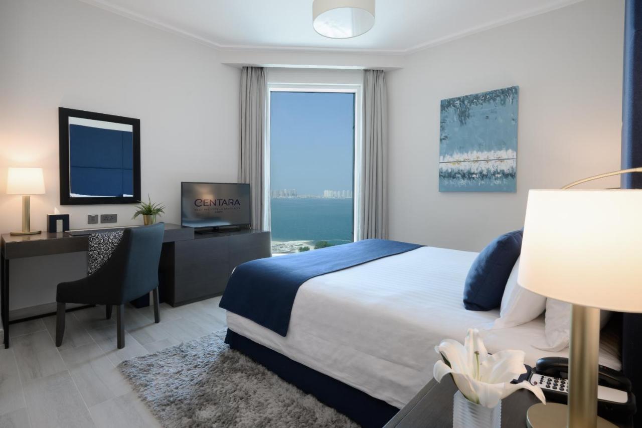 Centara West Bay Hotel & Residences Ad-Dauha Zewnętrze zdjęcie A bedroom at the Ritz-Carlton, Bahrain