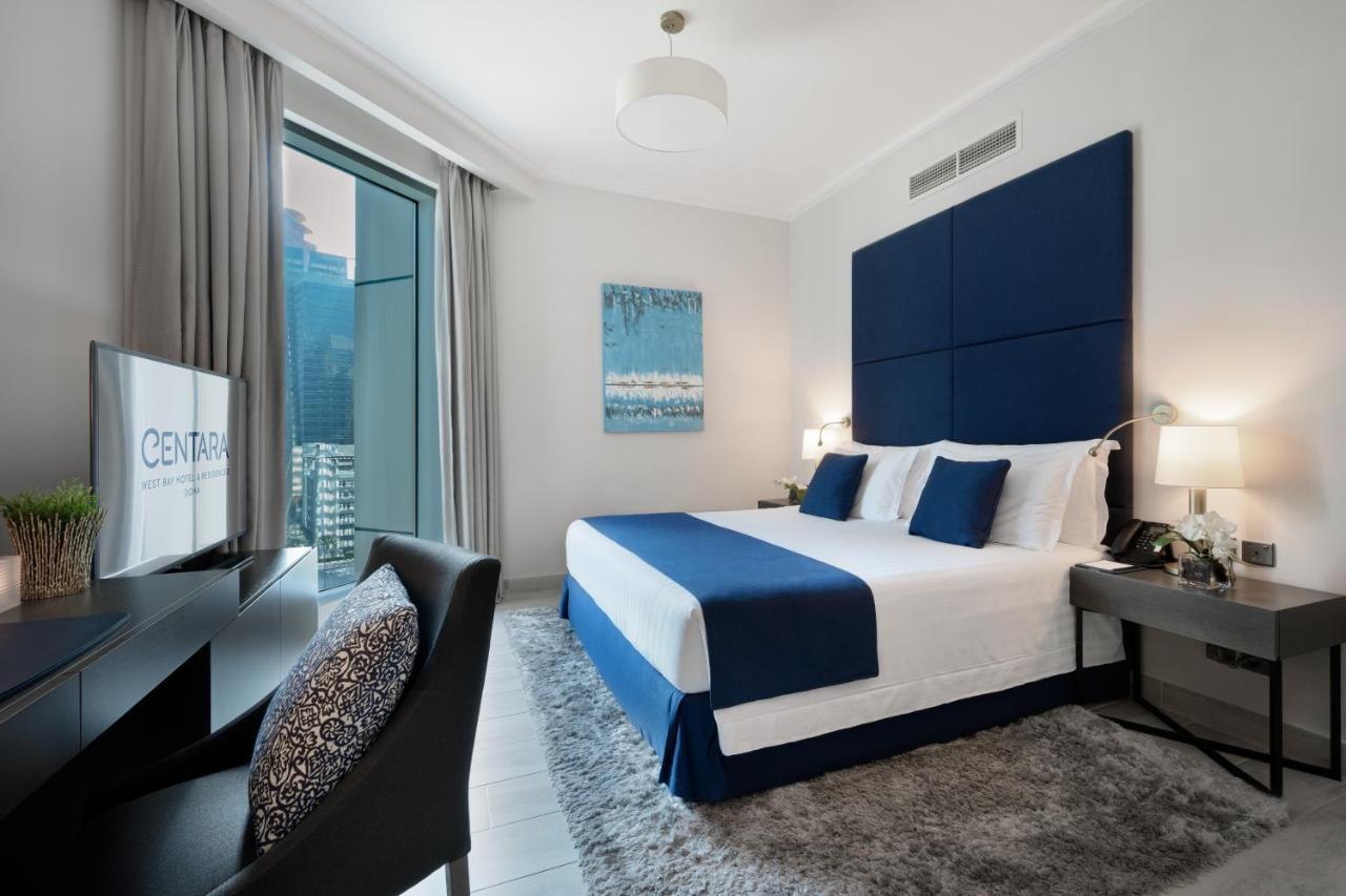 Centara West Bay Hotel & Residences Ad-Dauha Zewnętrze zdjęcie A bedroom at the Address Downtown Hotel